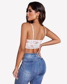 White lace V-neck camisole with scalloped hem and lace-up back straps