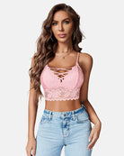 Pink lace V-neck camisole with crisscross neckline and scalloped lace hem