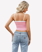 Ruched mesh crop tank top, pink, back view with thin straps and ruched center.