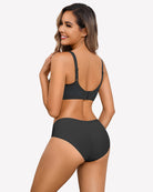 Black wireless padded V-neck bra with lace-textured back and adjustable straps