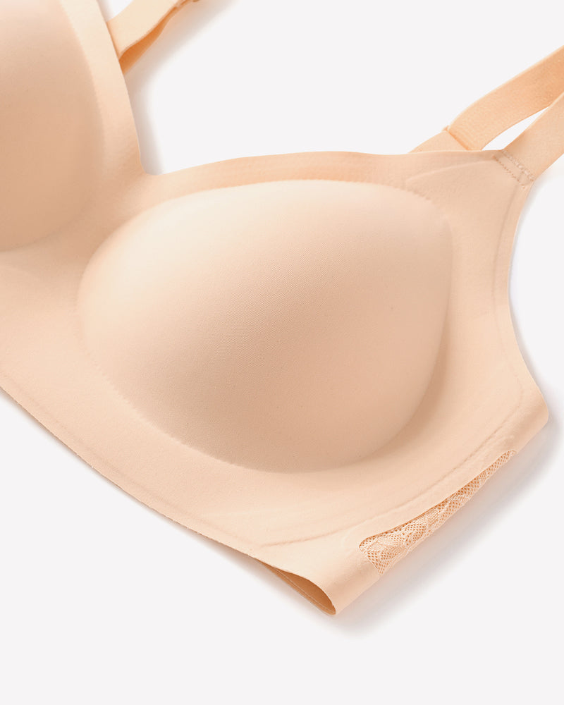 Wireless lace padded V-neck bra, nude close-up of smooth cup and lace edge