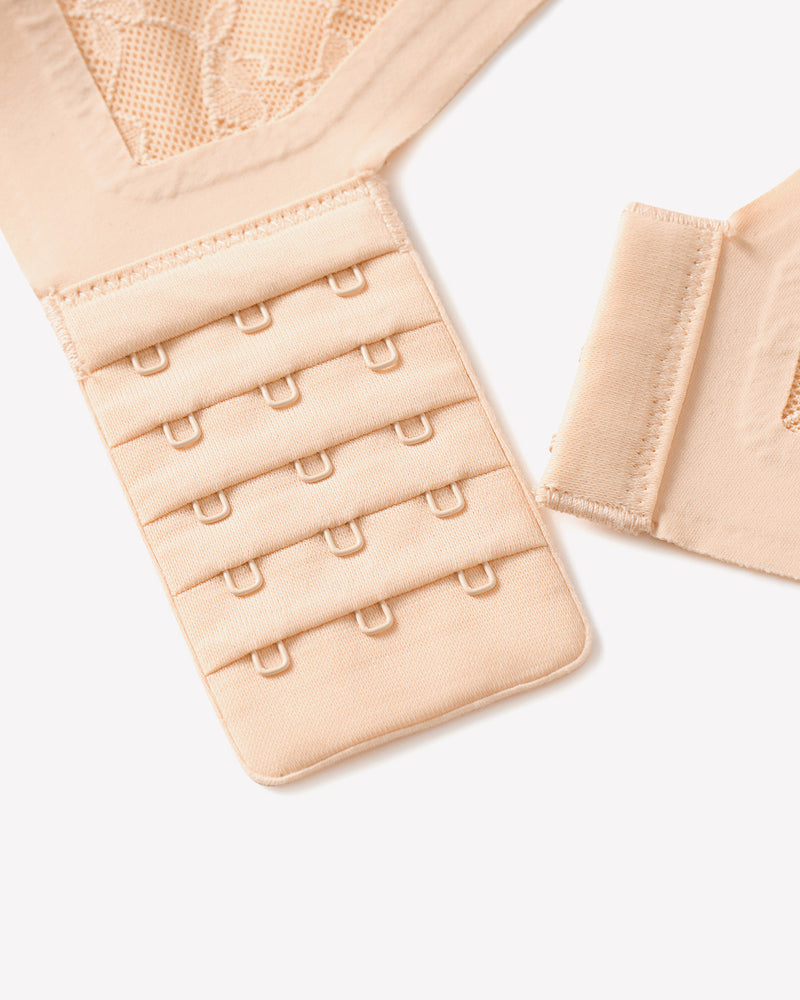 Wireless lace padded V-neck bra, nude hook-and-eye back band close-up