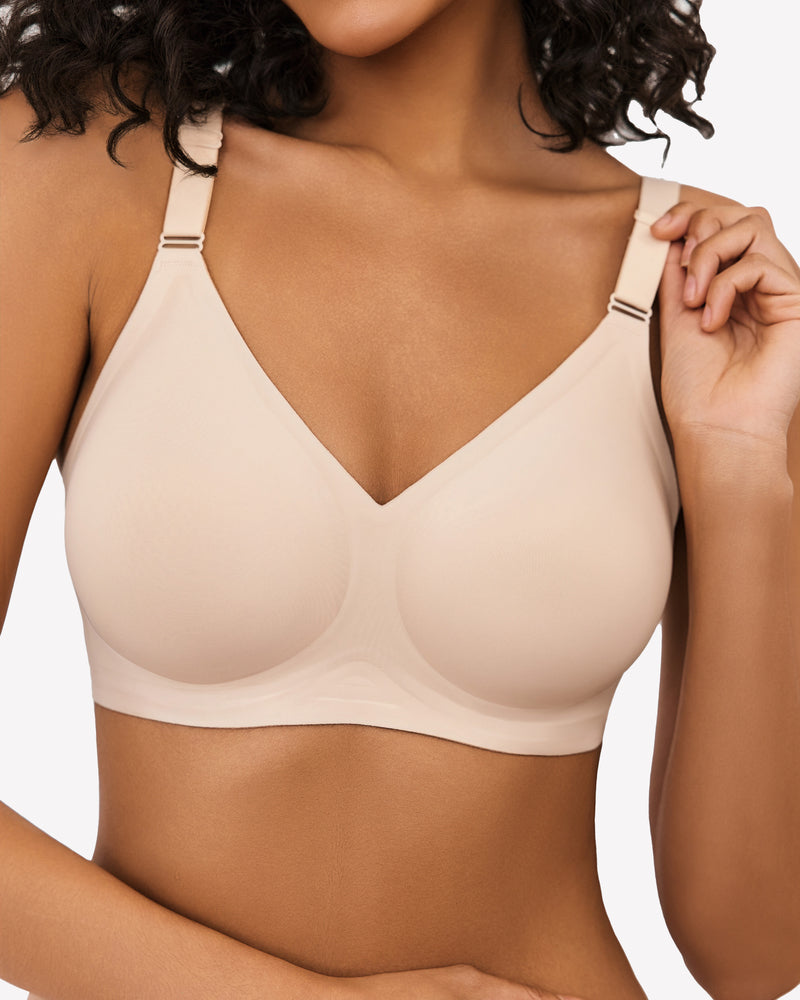 Nude push-up wireless bra with V neckline and adjustable straps, close-up.