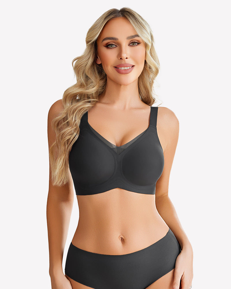 Seamless no-underwire comfort bra, black, scoop neckline and adjustable straps.