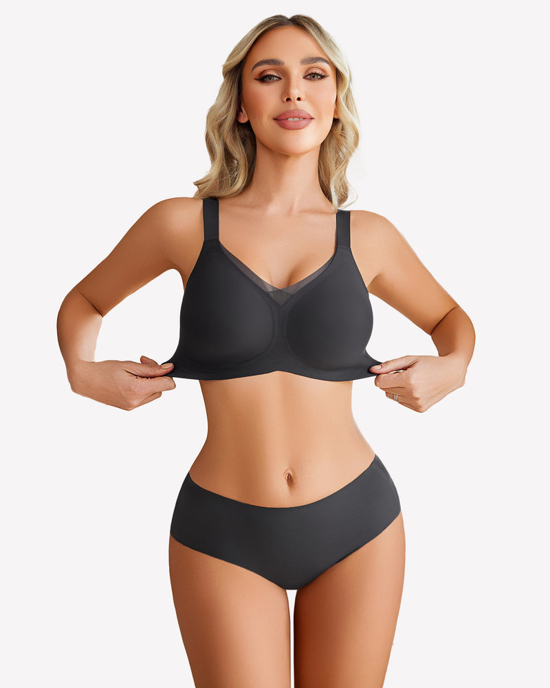 Seamless no-underwire comfort bra, black, full-coverage cups and adjustable straps.