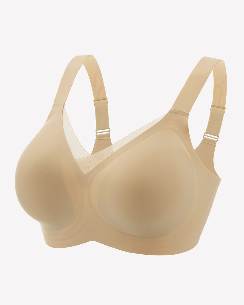 Seamless no-underwire bra in nude/tan, V-neck molded cups and adjustable straps.