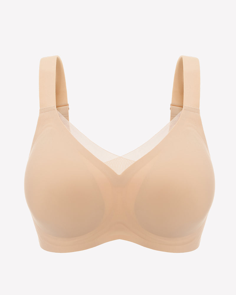 Nude beige seamless no-underwire bra with V-neck and wide-set adjustable straps.