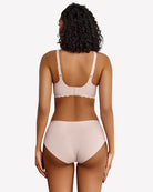 Light pink wireless V-neck seamless full coverage bra, back view with adjustable straps