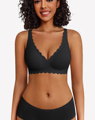 Black wireless V-neck seamless full-coverage bra with scalloped trim and adjustable straps