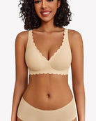Nude wireless V-neck seamless full-coverage bra with scalloped trim and adjustable straps