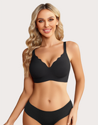 Black seamless wireless push-up bralette bra with scalloped plunge cups and wide straps.