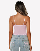 Pink back mesh crop tank with thin straps and scalloped hem