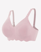 Light pink seamless wireless bralette with V-neck and adjustable straps, front view