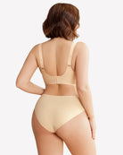 Nude wireless push-up bra back view with adjustable straps and seamless cups