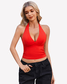 Red halter crop tank top with deep V neckline, fitted ruched front