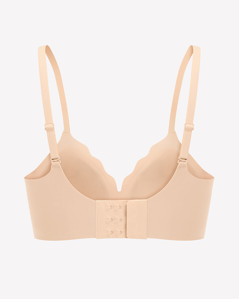 Nude seamless wireless push-up bra front with adjustable straps and hook closure