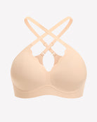 Nude seamless wireless full bra with crossed back straps, smooth full-coverage cups