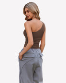 One-shoulder crop tank top in brown with ruched waist detail, back view