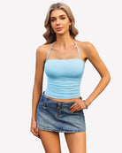Light blue halter ruched crop tank with thin straps and smooth fitted bodice
