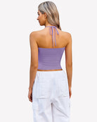 Light purple halter ruched crop tank with open back and tied halter neck straps