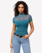 Mesh short-sleeve bodysuit with turtle neck, teal blue, ruched front.