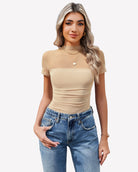 Mesh short-sleeve bodysuit with turtle neck, nude, ruched fit.
