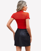 Red short-sleeve turtleneck bodysuit, ruched back and fitted silhouette