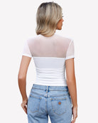 White short-sleeve turtleneck bodysuit back view, sheer yoke and ruched waist