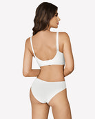 White wireless push-up bralette bra viewed from back, with adjustable straps.