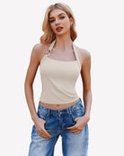 Double-lined ribbed backless crop top in nude halter, front view
