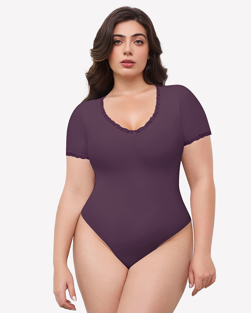 Double-lined lace V-neck bodysuit in dark plum with lace-trim neckline and sleeves