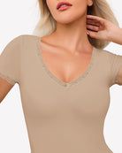 Beige lace V-neck double-lined bodysuit with scalloped neckline and short sleeves