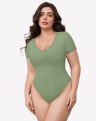Green lace V-neck double-lined bodysuit with scalloped trim and short sleeves