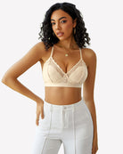 White lace racerback wireless bralette with scalloped V-neck and sheer cups