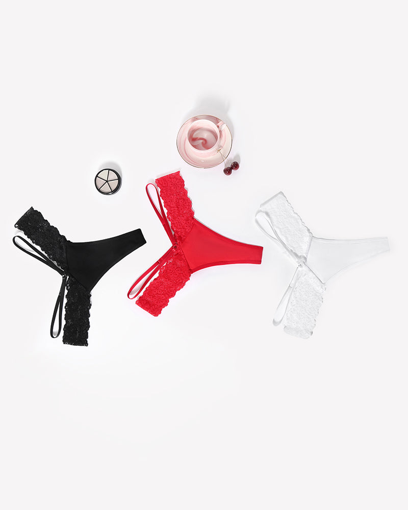 Lace thong panties assortment in black, red, and white with narrow strap