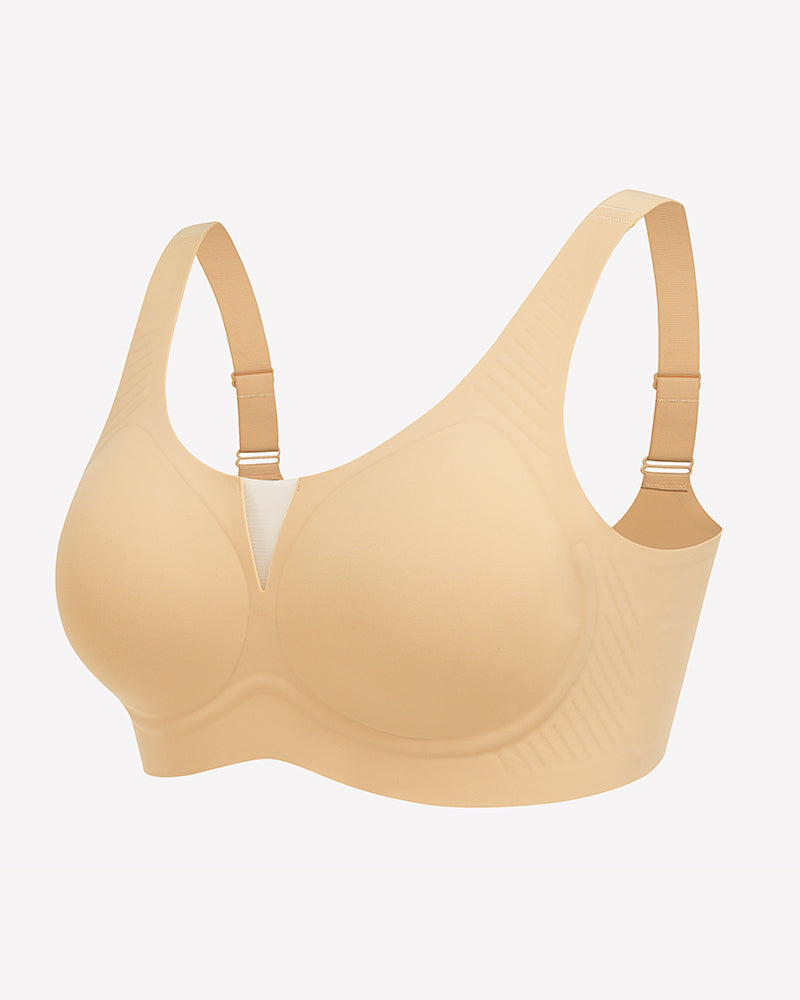 Seamless deep V comfort bra, nude/beige, side view with smooth cups and adjustable straps