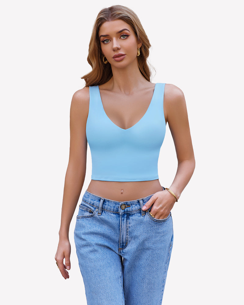 Front view of light blue crop plunge tank top with V-neck and wide straps