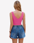 Pink crop tank top with low back V-neck and sleeveless fitted cut