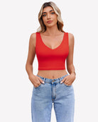 Red crop plunge tank top with V-neck and sleeveless fitted silhouette