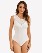 Mesh crew neck sleeveless bodysuit in white with sheer V front panel