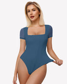 Dark blue square-neck mesh double bodysuit with short sleeves, fitted high-cut legs.