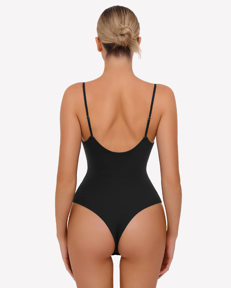 Black ruched thong bodysuit with thin spaghetti straps, back view.