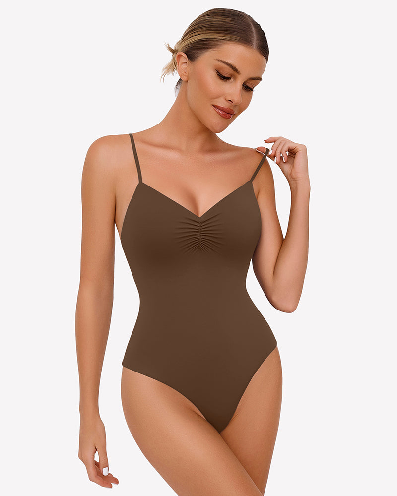Brown ruched V-neck thong bodysuit with thin spaghetti straps.