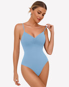 Light blue ruched V-neck thong bodysuit with thin spaghetti straps.