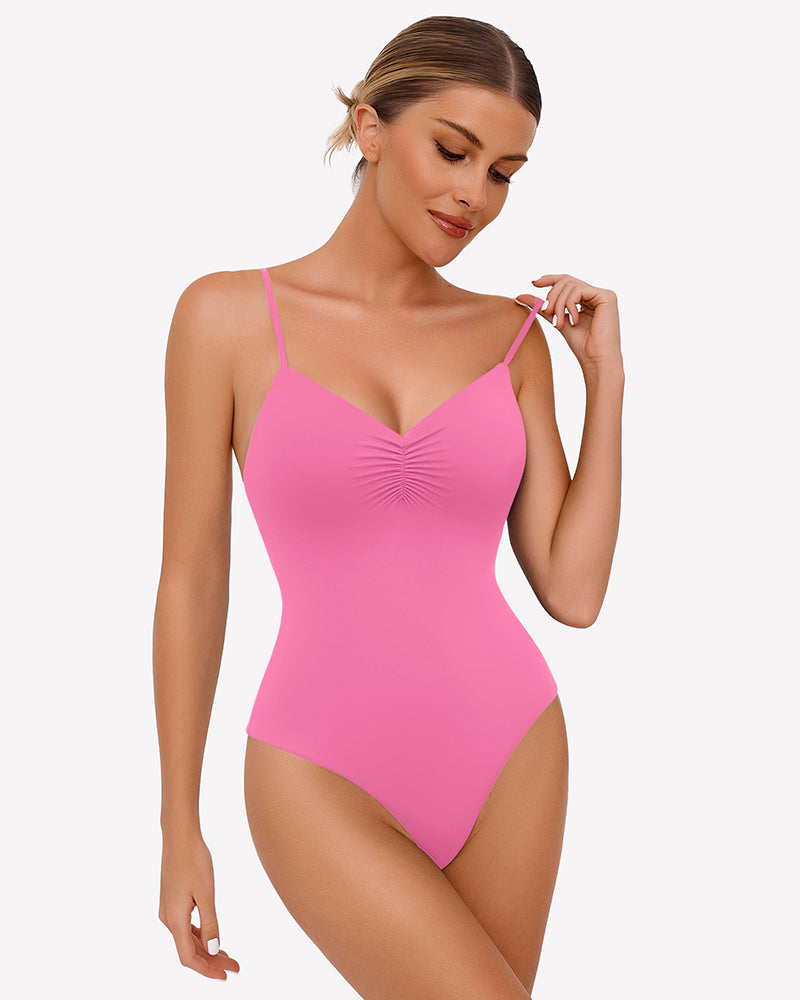 Ruched V-neck thong bodysuit in bright pink, with spaghetti straps and gathered bust