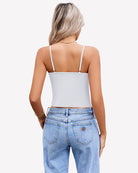 Women’s twist-front crop tank top with spaghetti straps, white color, open back view