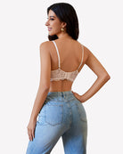 Champagne lace bra back with adjustable thin straps and scalloped lace band.