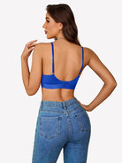 Blue wireless bralette back view with thin straps and center closure