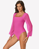 Hot pink puff long-sleeve bodysuit with square neckline and fitted high-cut leg