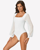White puff long-sleeve bodysuit with square neckline and fitted high-cut leg